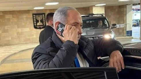 Arab media speculates on security risks after Netanyahu's phone camera incident