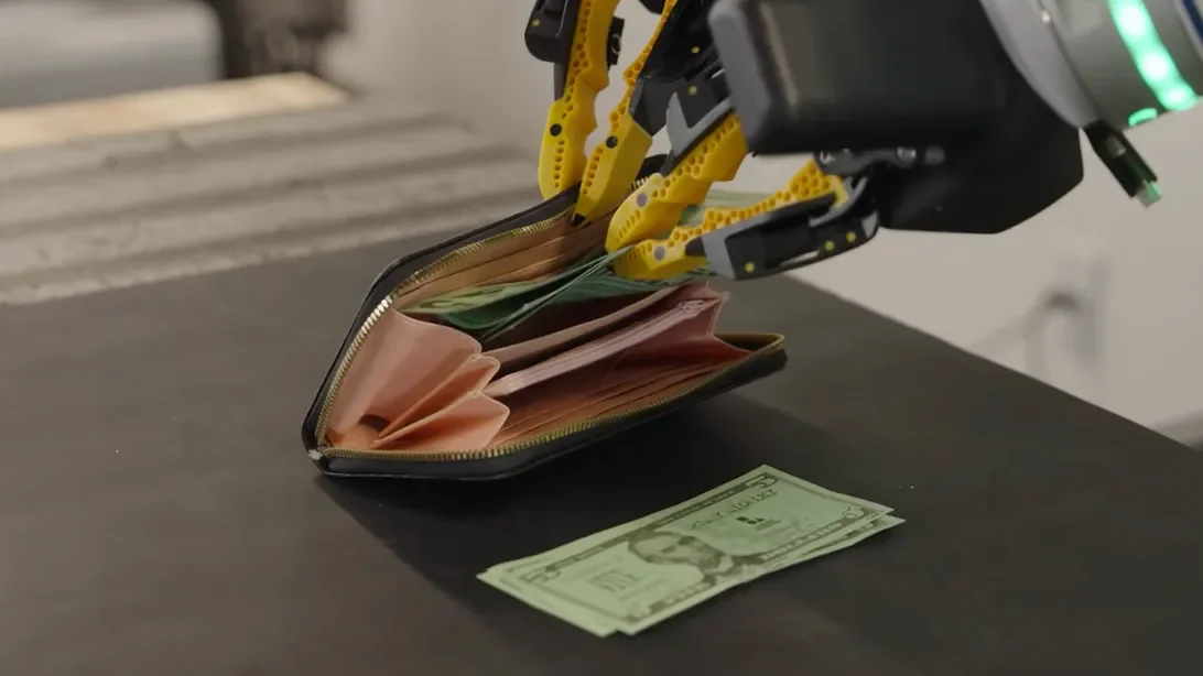 Cash Handling Revolutionized: Robot Mimics Human Wallet Stuffing Skills