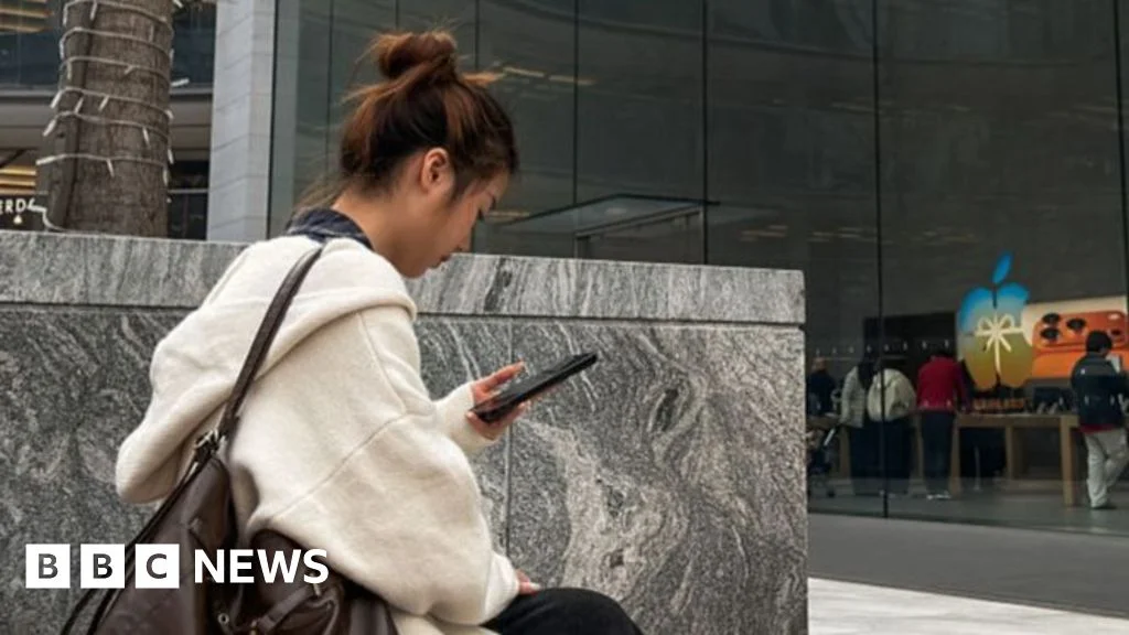 iPhone sales surge to record highs, overshadowing declining Mac performance