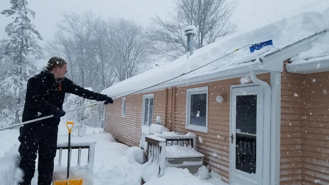 Snowy Weather Warning: Protect Your Home by Raking Off Roof Accumulation